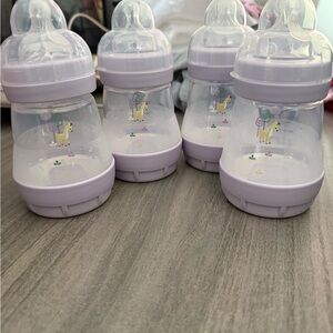 MAM Set of 4 Purple Baby Bottles with Giraffe Design
